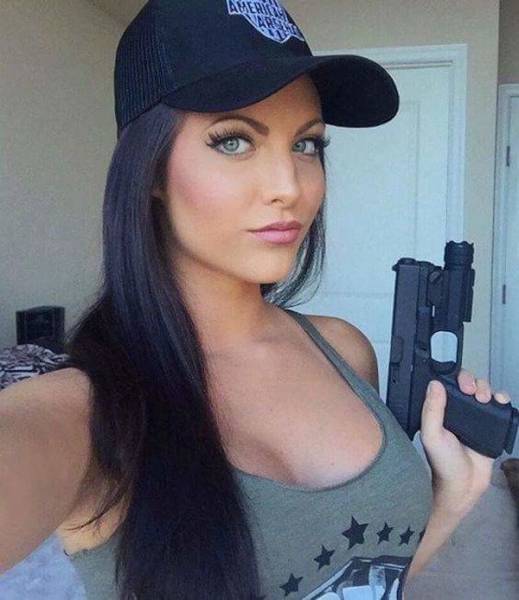 Awesome Girls Holding Big Guns – What Could Be Better?