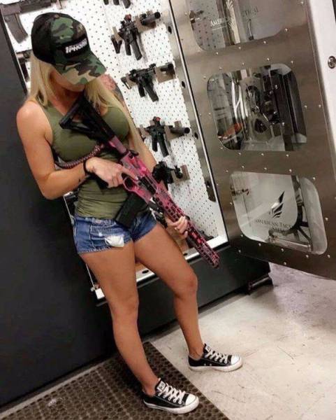 Awesome Girls Holding Big Guns – What Could Be Better?