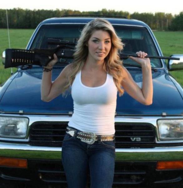 Awesome Girls Holding Big Guns – What Could Be Better?