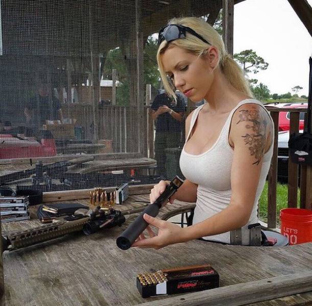 Awesome Girls Holding Big Guns – What Could Be Better?