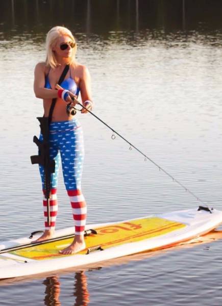 Awesome Girls Holding Big Guns – What Could Be Better?