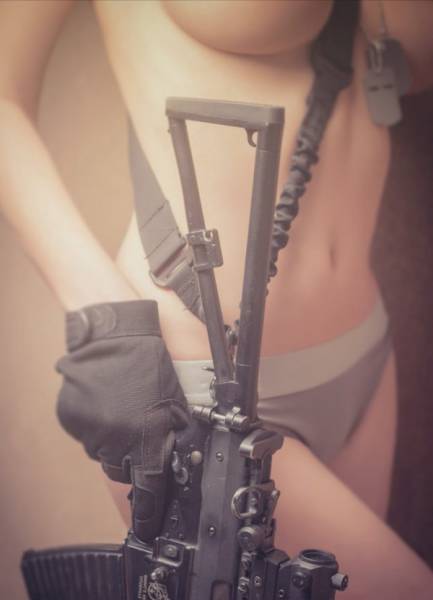 Awesome Girls Holding Big Guns – What Could Be Better?