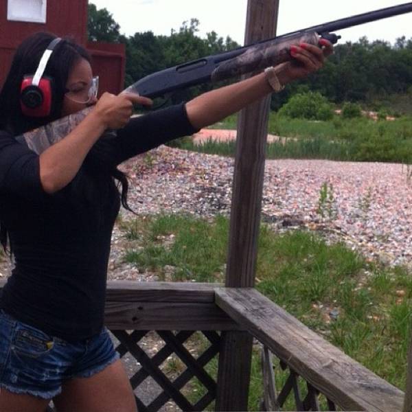 Awesome Girls Holding Big Guns – What Could Be Better?