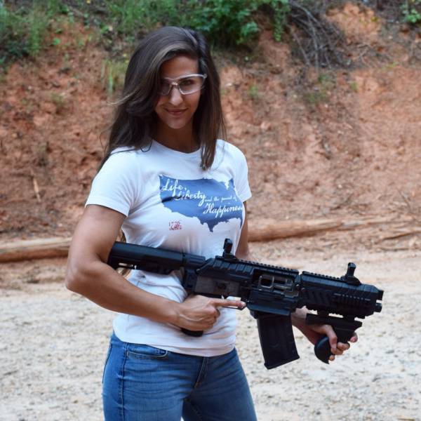 Awesome Girls Holding Big Guns – What Could Be Better?