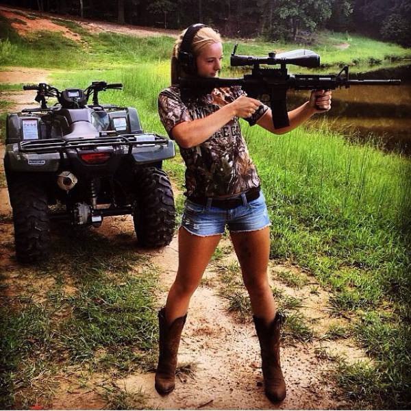 Awesome Girls Holding Big Guns – What Could Be Better?