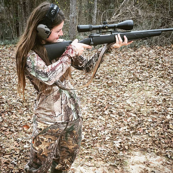 Awesome Girls Holding Big Guns – What Could Be Better?