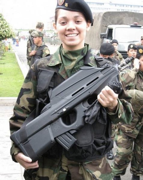 Cute Girls and Guns Go Well Together