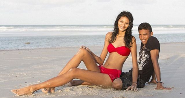 Teen Girl Towers Over Her Lover