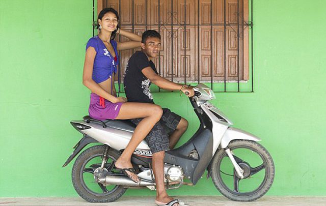 Teen Girl Towers Over Her Lover