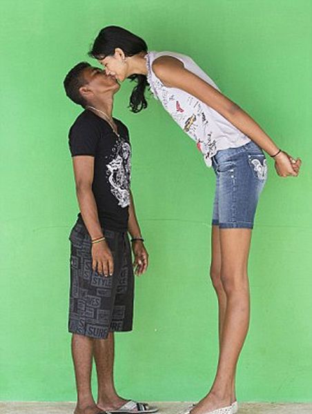 Teen Girl Towers Over Her Lover