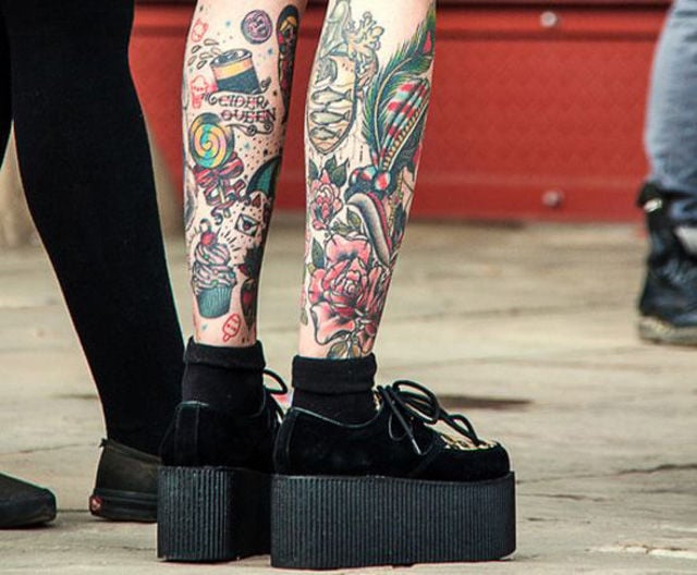 Tattoo Lovers Gather around for Epic Body Art