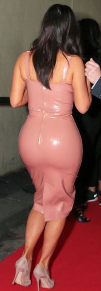 Kim Kardashian Squeezes Her Curves into Pink Latex
