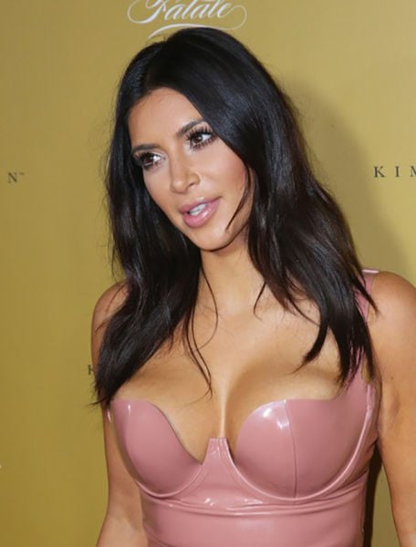 Kim Kardashian Squeezes Her Curves into Pink Latex