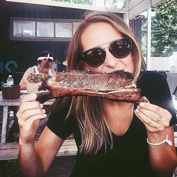 Some Hot Ladies Tuck into Some BBQ