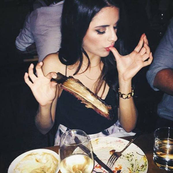 Some Hot Ladies Tuck into Some BBQ