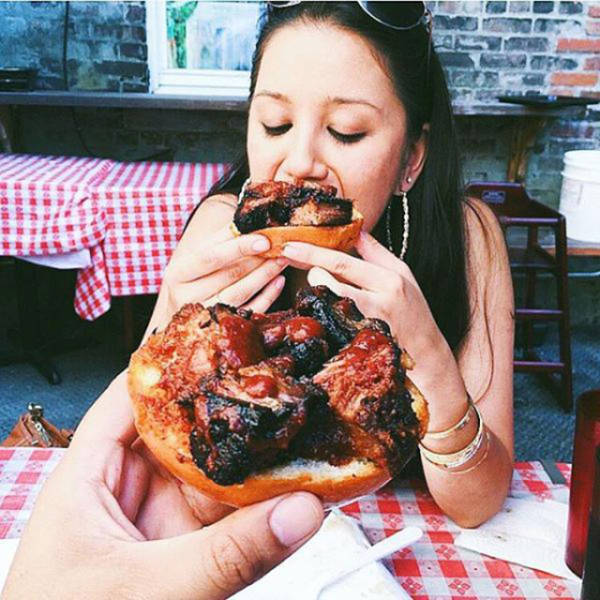 Some Hot Ladies Tuck into Some BBQ