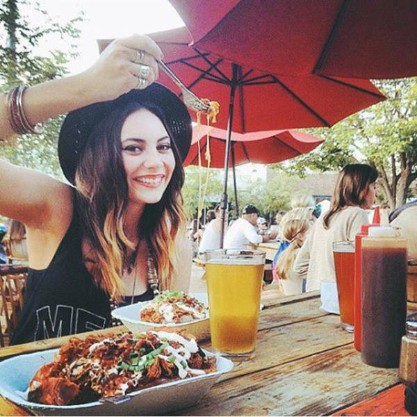 Some Hot Ladies Tuck into Some BBQ