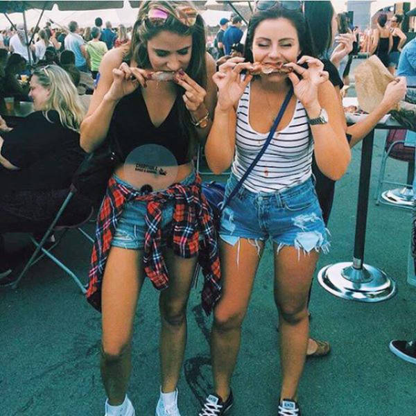 Some Hot Ladies Tuck into Some BBQ