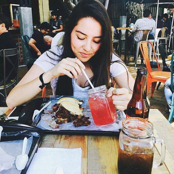 Some Hot Ladies Tuck into Some BBQ